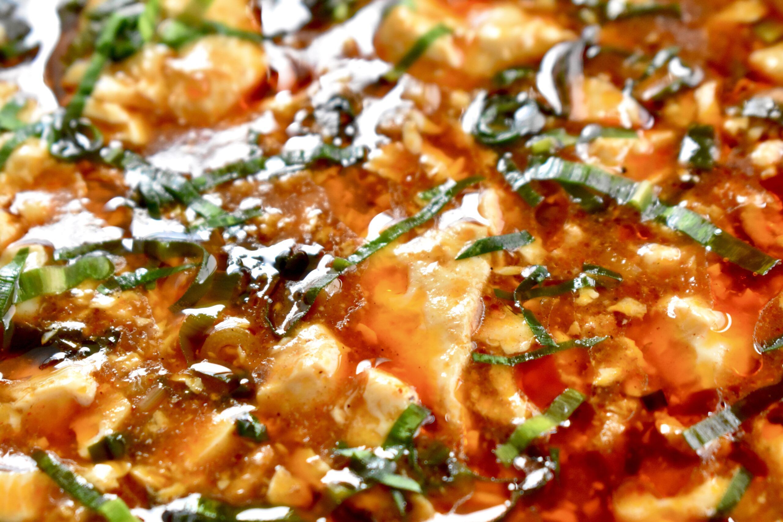 Close-up of a gourmet dish garnished with herbs.