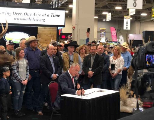 Mule Deer Foundation signing event with attendees