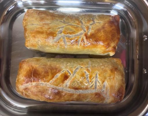 Baked pastries with mule deer and mountain designs