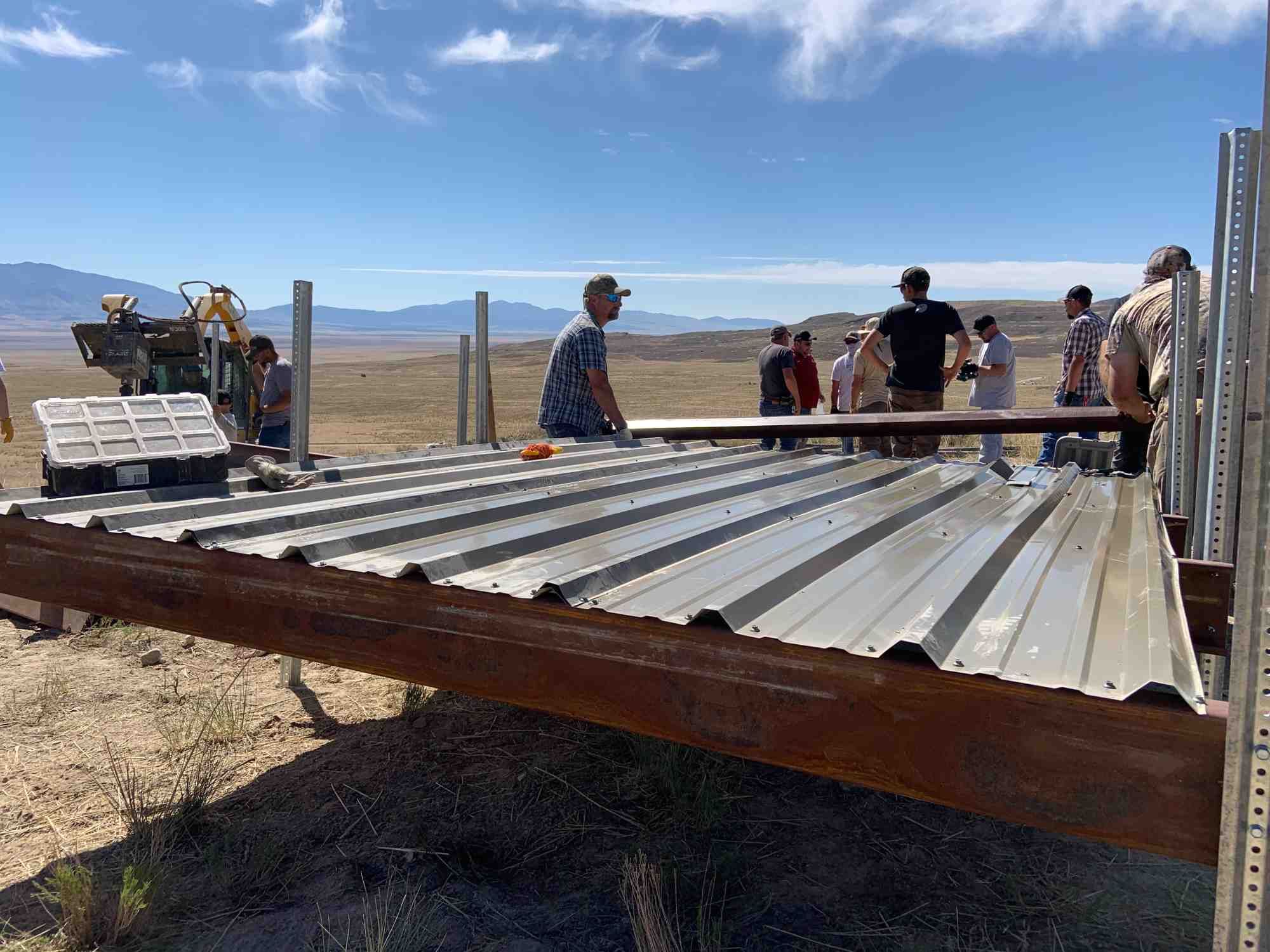 Volunteers working on habitat shelter construction.