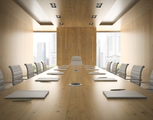 Contemporary conference room with a large table and chairs