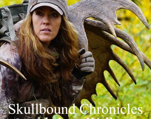 Jana Waller with hunting gear and antlers in the forest