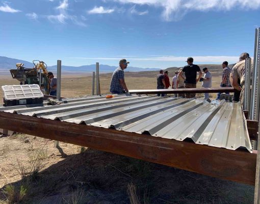 Volunteers working on habitat shelter construction.