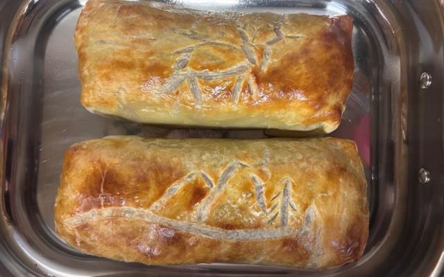 Baked pastries with mule deer and mountain designs