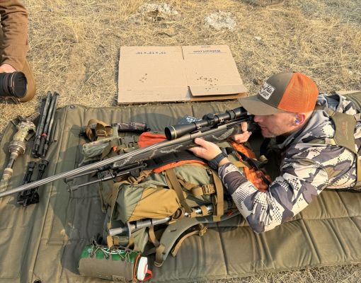 Participant practicing shooting at a firearms safety training course.