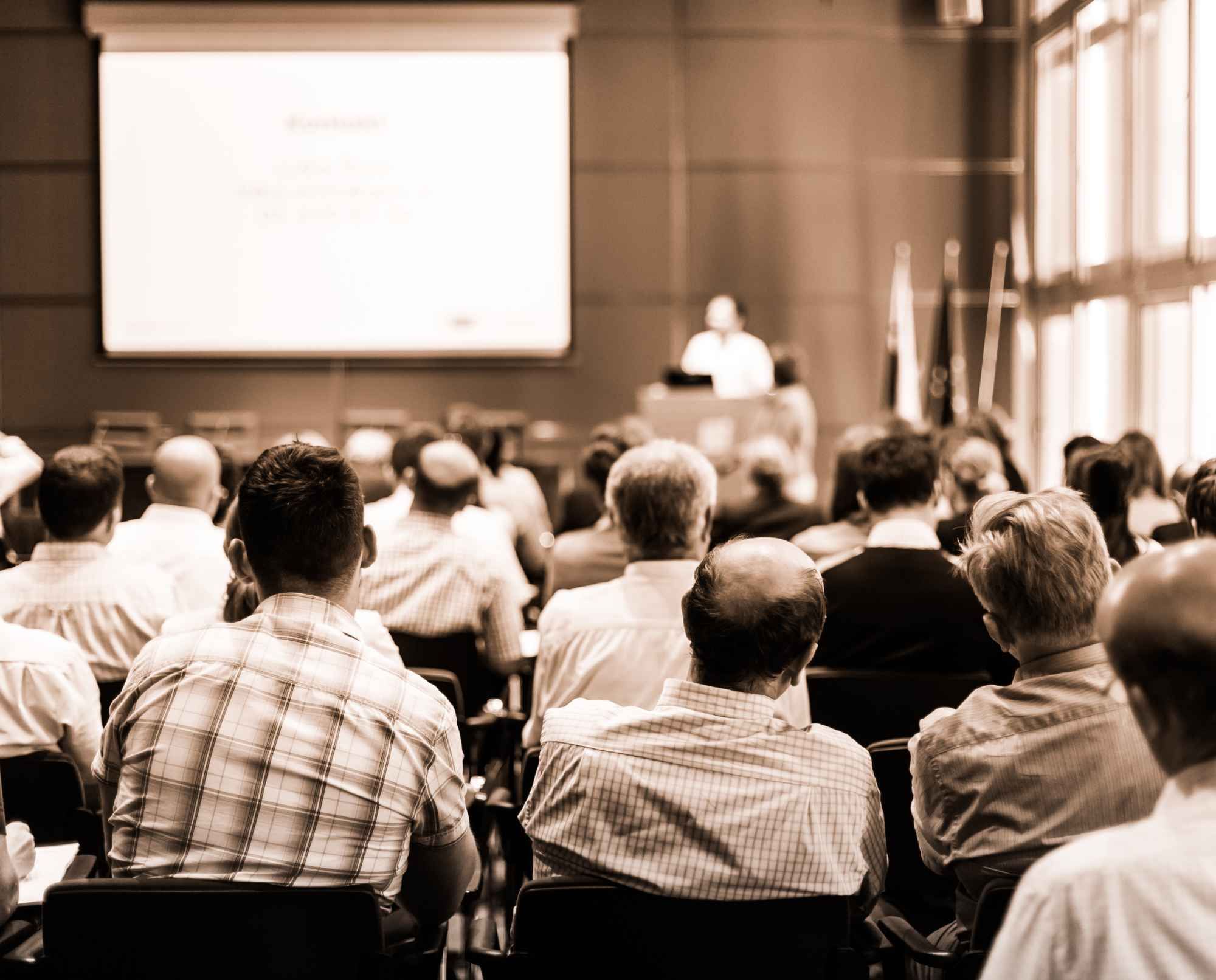Audience engaged during a presentation at a conference