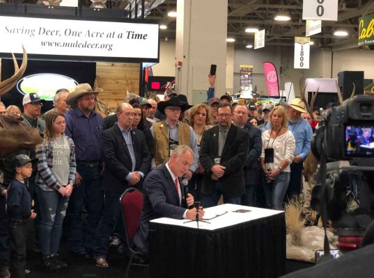 Mule Deer Foundation signing event with attendees