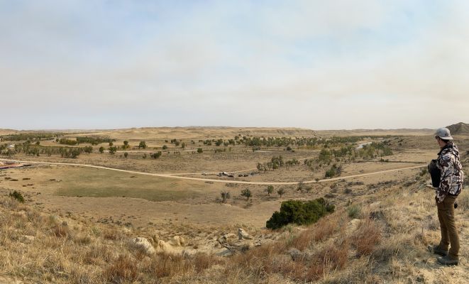 Man observing the landscape in the northern plains.