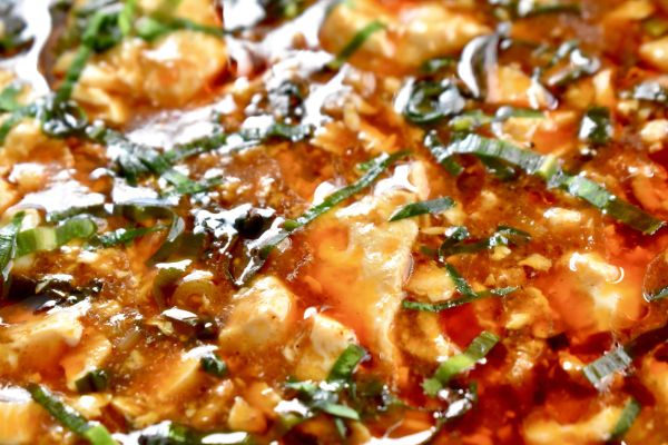 Close-up of a gourmet dish garnished with herbs.