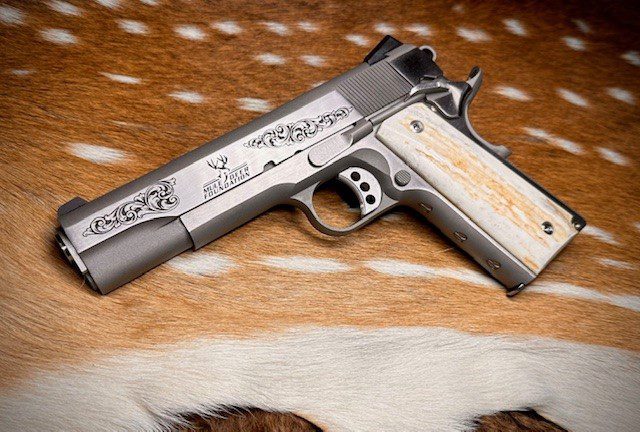 decorative handgun placed on animal hide background