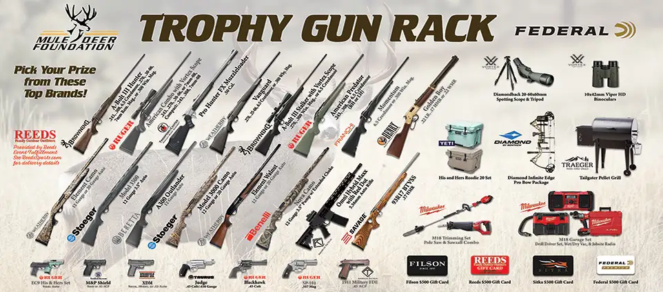 Collection of firearms and gear on display for Mule Deer Foundation