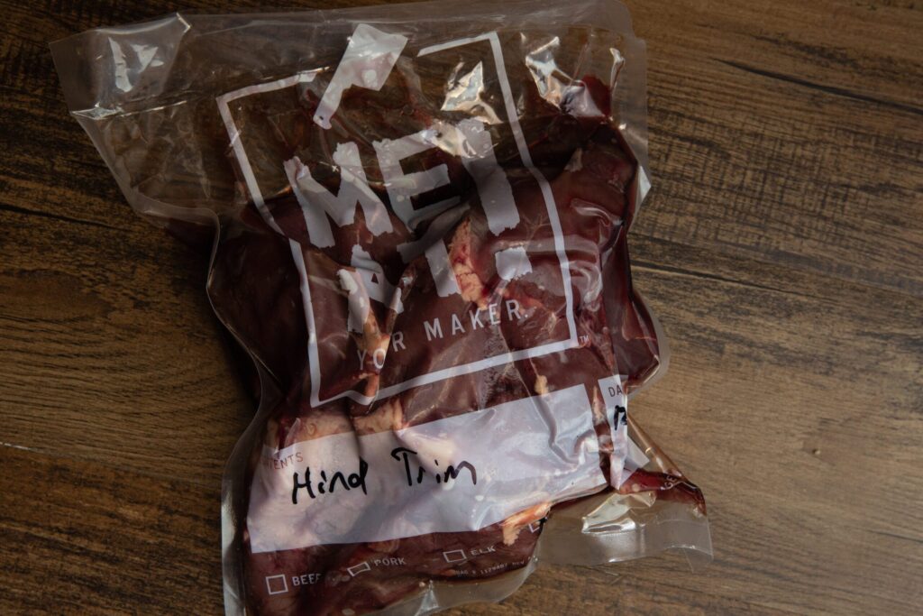 Packaged hind trim of game meat