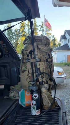 Hunting backpack and water bottle in truck bed